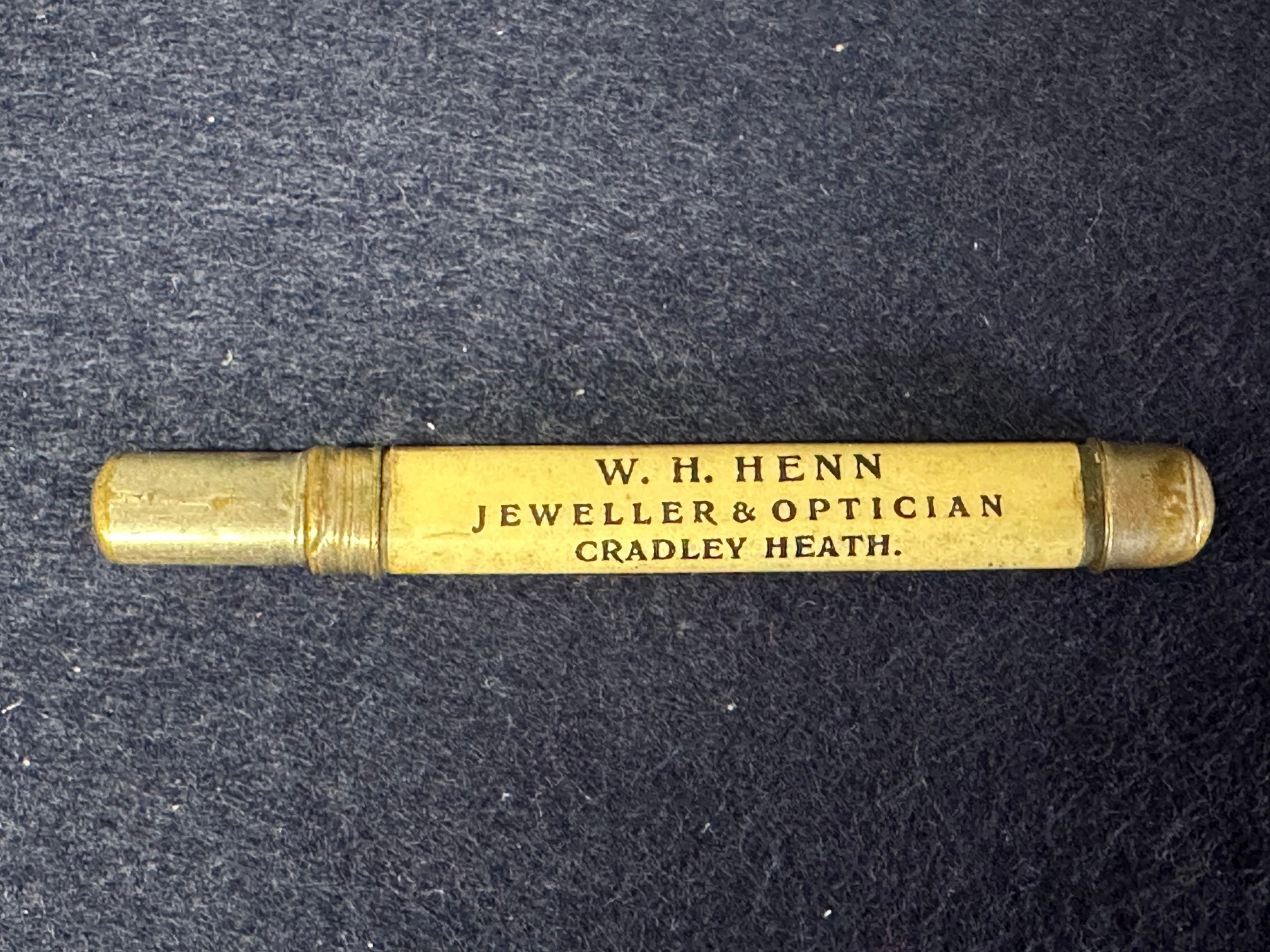 A pencil advertising W.H. Henn Jeweller & Optician, Cradley Heath - Quality & Value in Diamond - Image 2 of 3