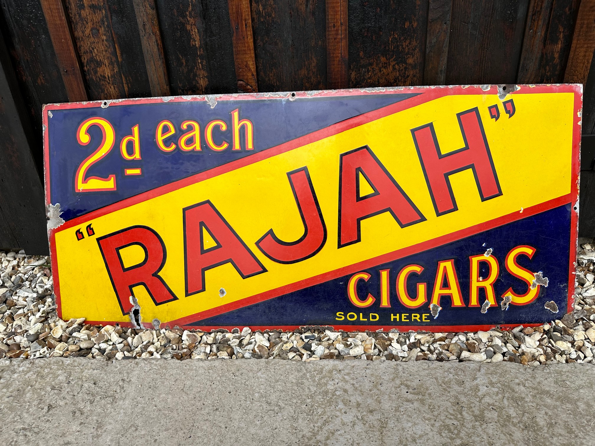 A tobacco enamel sign advertising Rajah Cigars at 2d each by Stainton & Hulme Ltd. B'Ham, 41 1/2 x