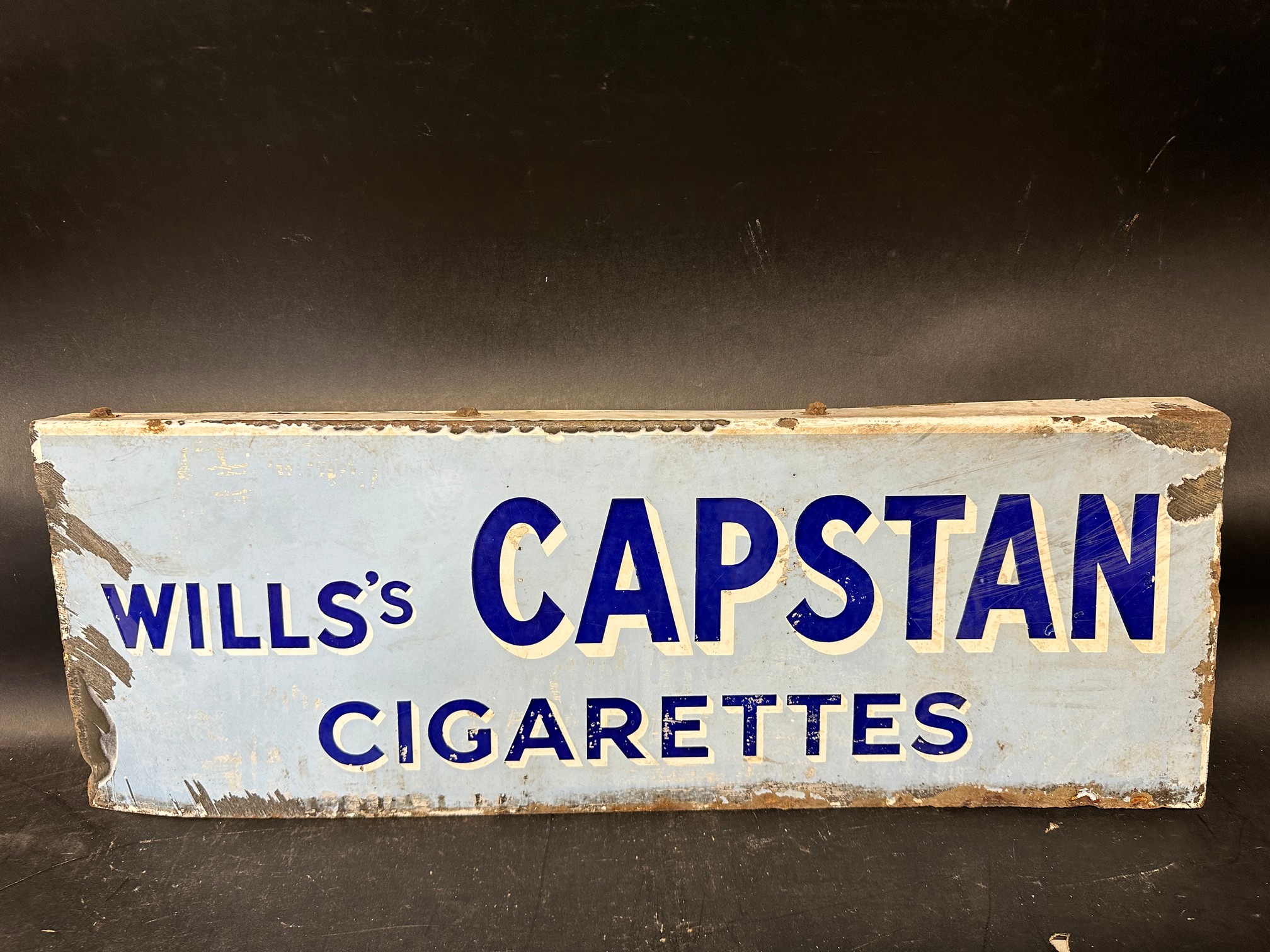 A Wills's Capstan Cigarettes double sided enamel advertising sign, unusually with hanging flange