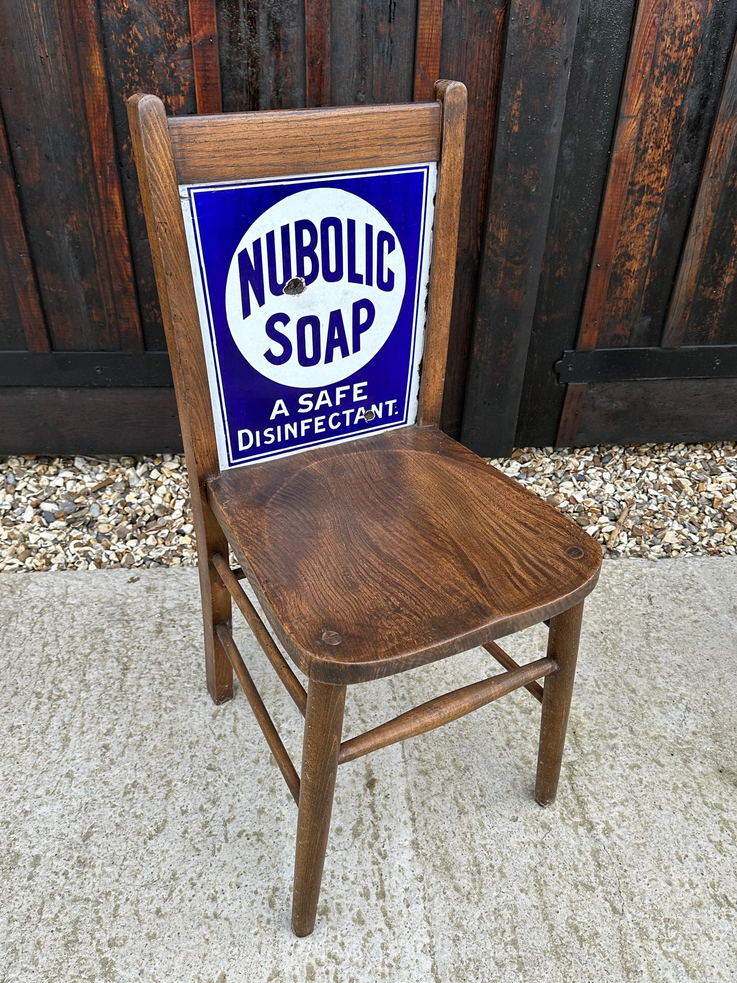 A Nubolic Soap 'A Safe Disinfectant' enamelled back advertising chair with Watson's Matchless