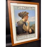 An F & J. Smith's Harvest Moon Cigarettes framed and glazed advertisement, frame measures 22 1/4 x