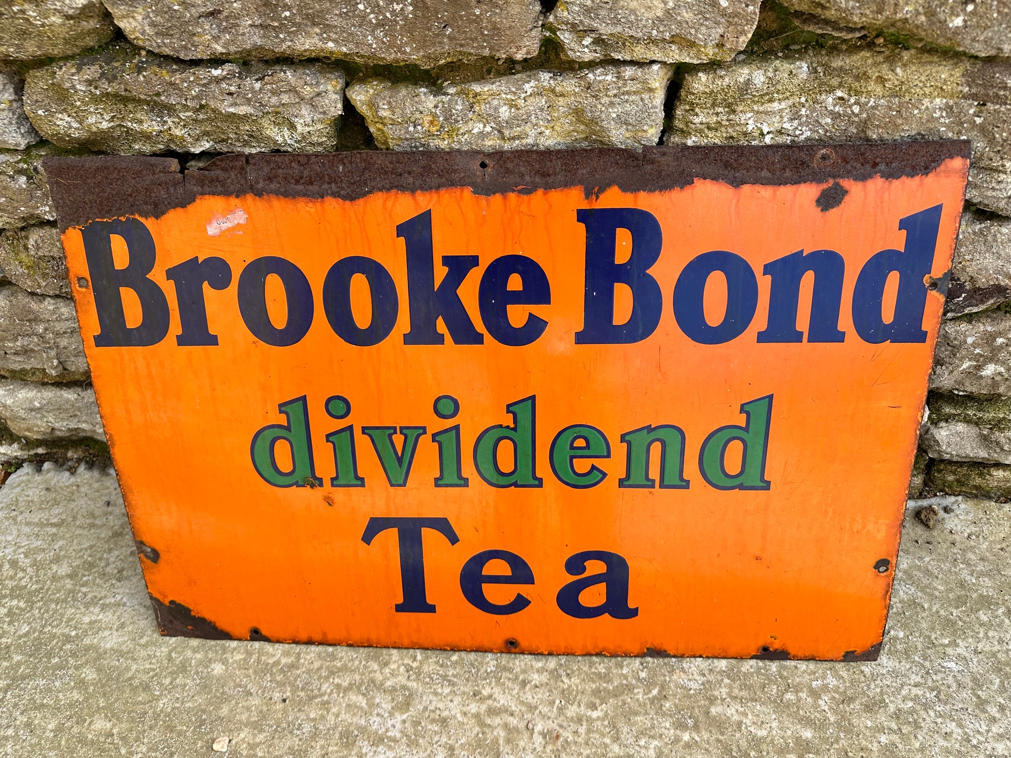 A Brooke Bond Dividend Tea enamel advertising sign, 30 x 20".
