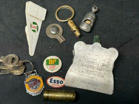 A selection of advertising and collectables inc. three whistles, a National Benzole Super keyring, a