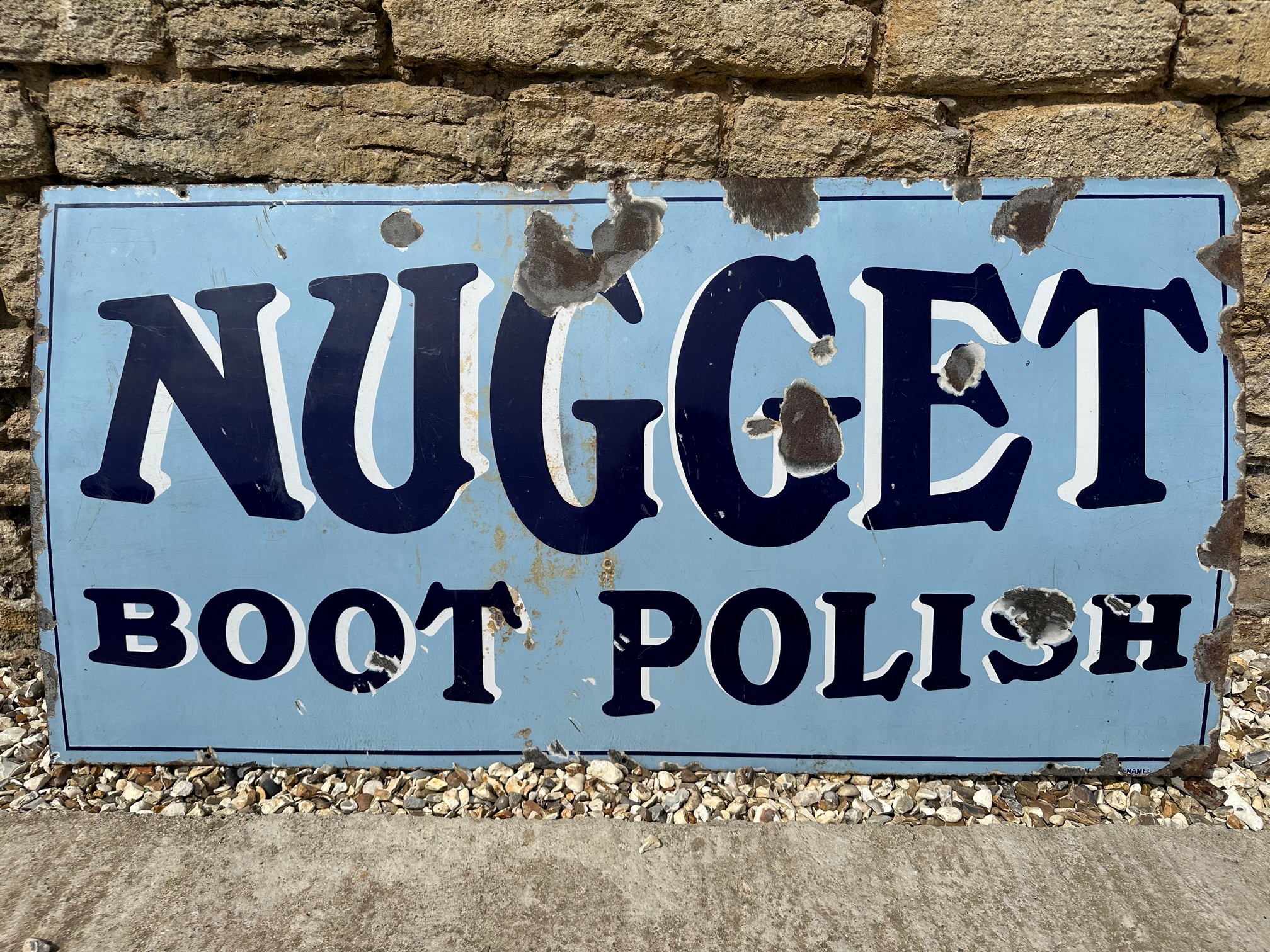 A rare Nugget Boot Polish enamel advertising sign, 48 x 24".
