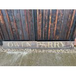 Two parts of a wooden hand painted Welsh advertising sign 'Owen Parry', 48 x 10 1/2" each.