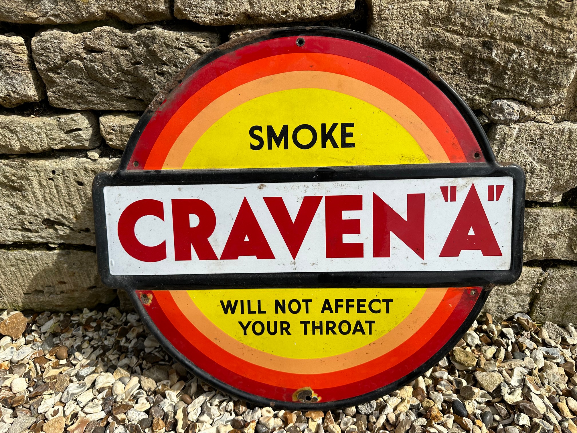 A Craven "A" metal advertising sign 'Will Not Affect Your Throat', 12 3/4 x 14 1/2".