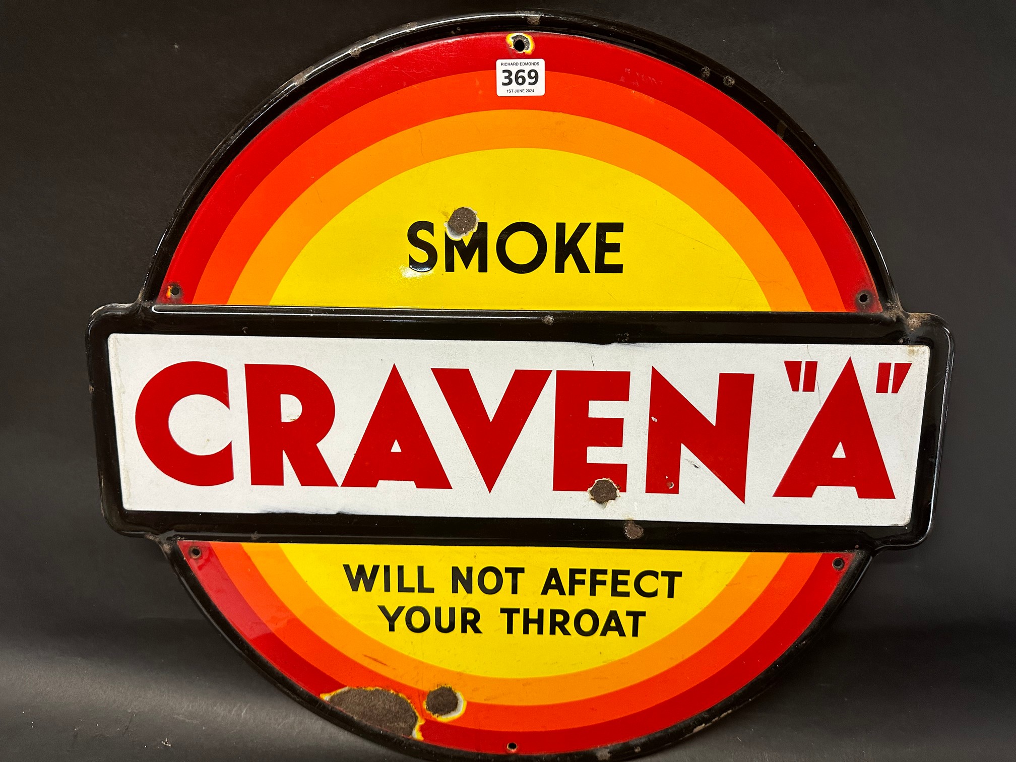 A Craven "A" circular enamel advertising sign, 24 x 22".