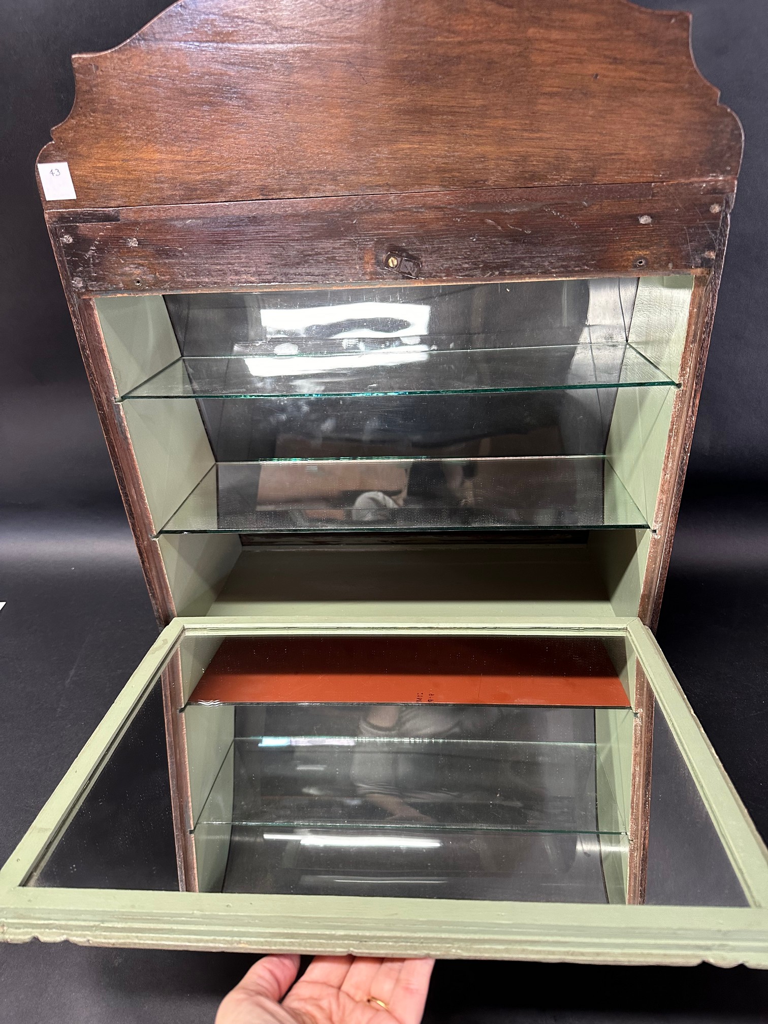 A Fry's Chocolates bowed glass cabinet with pediment, 25 1/2" tall x 9 1/2" deep x 17 3/4" wide. - Image 7 of 7
