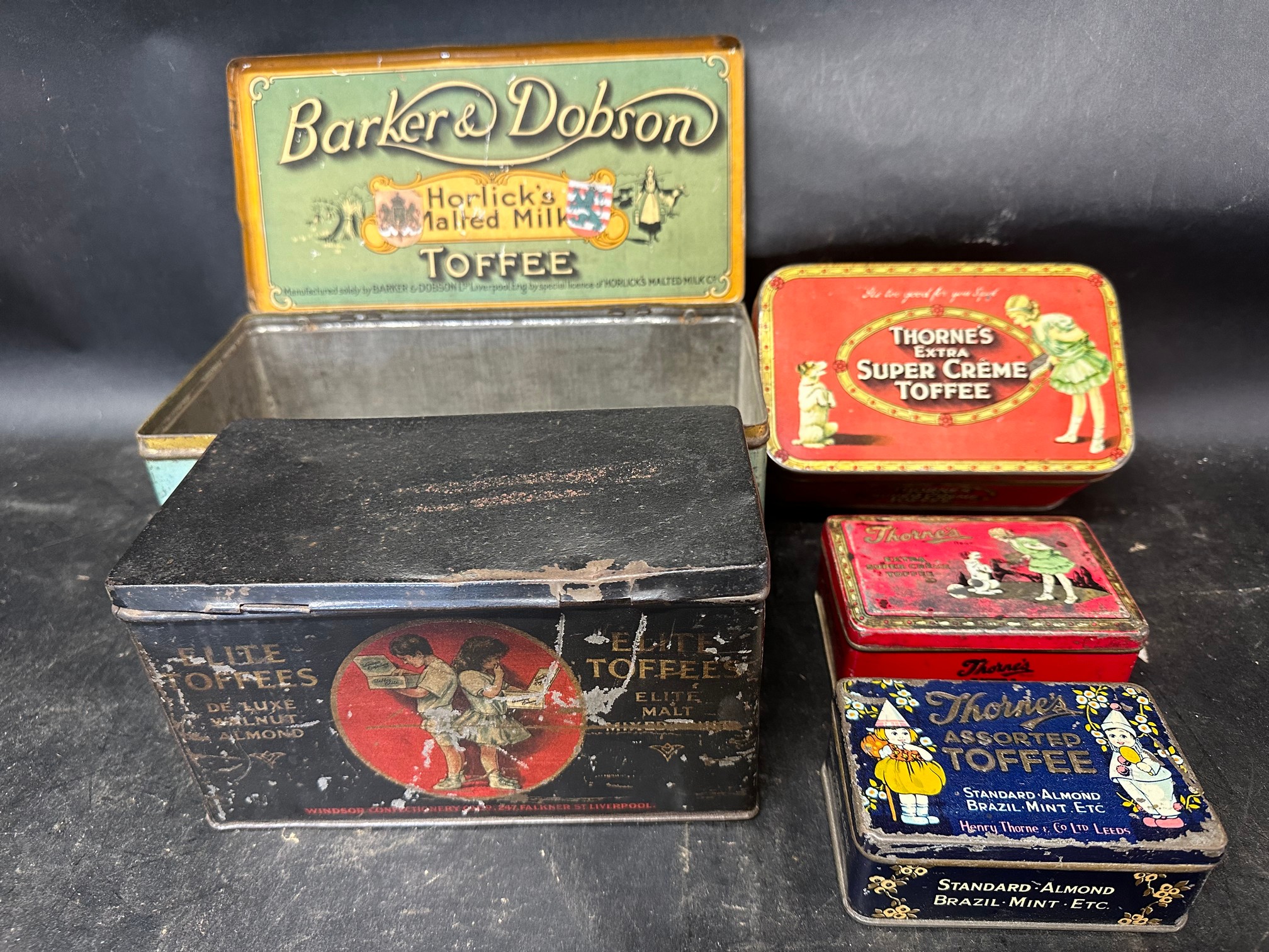 Five toffee tins: Elite Toffees by Windsor Confectionery Co. Ltd. Liverpool, Thorne's by Henry