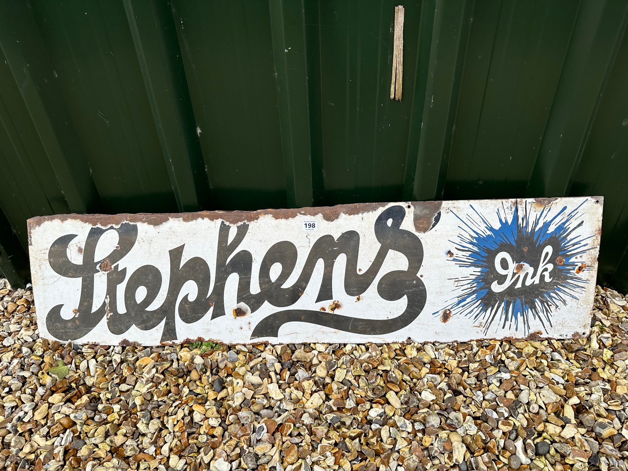 A Stephens' Ink horizontal 'splash' enamel advertising sign, 48 x 12", by repute from Basingstoke