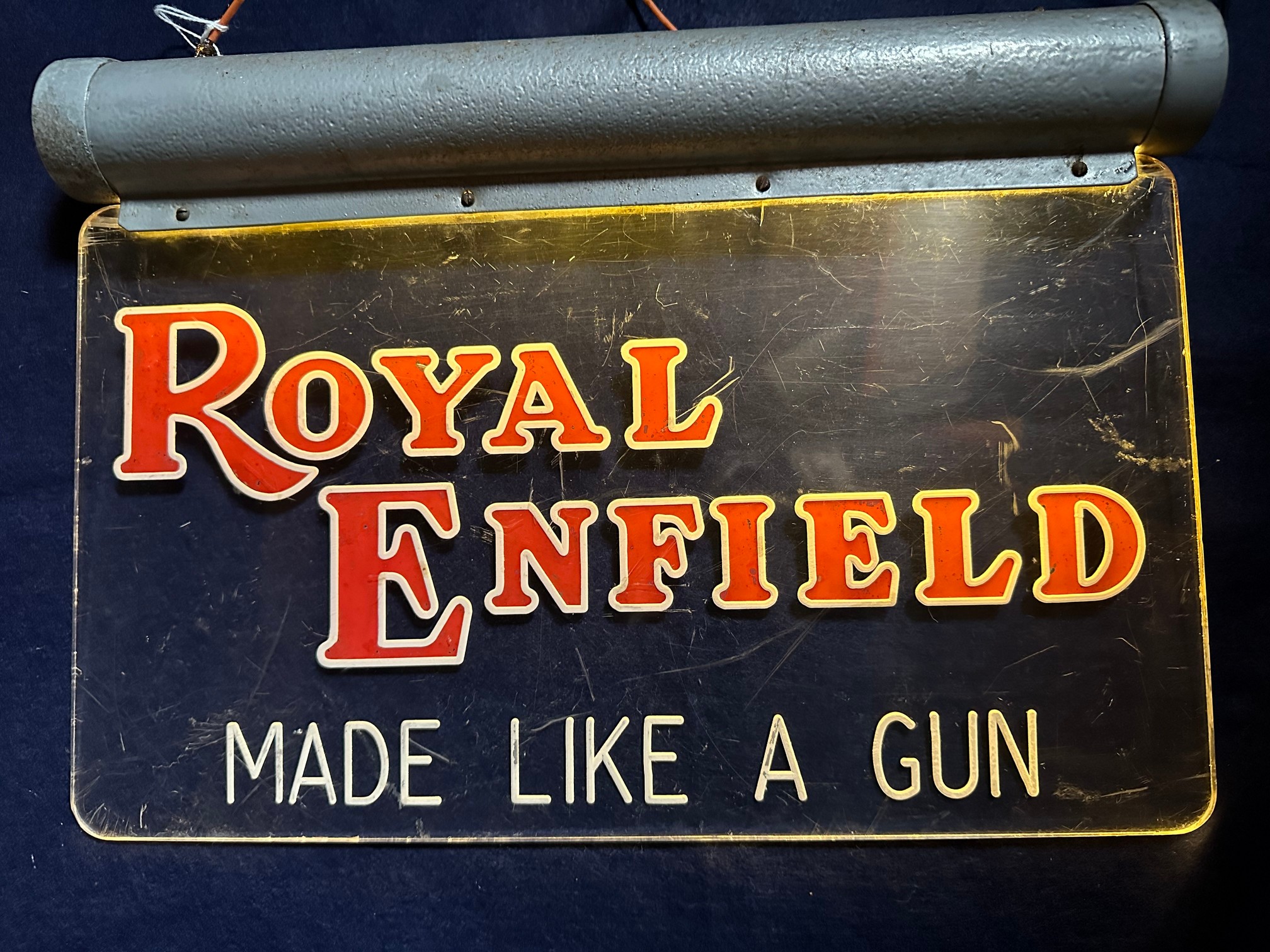 A Royal Enfield 'Made like a gun' light up sign, 15 1/2 x 11".