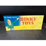 A Dinky Toys shop display showcard, 18 x 7 1/2".