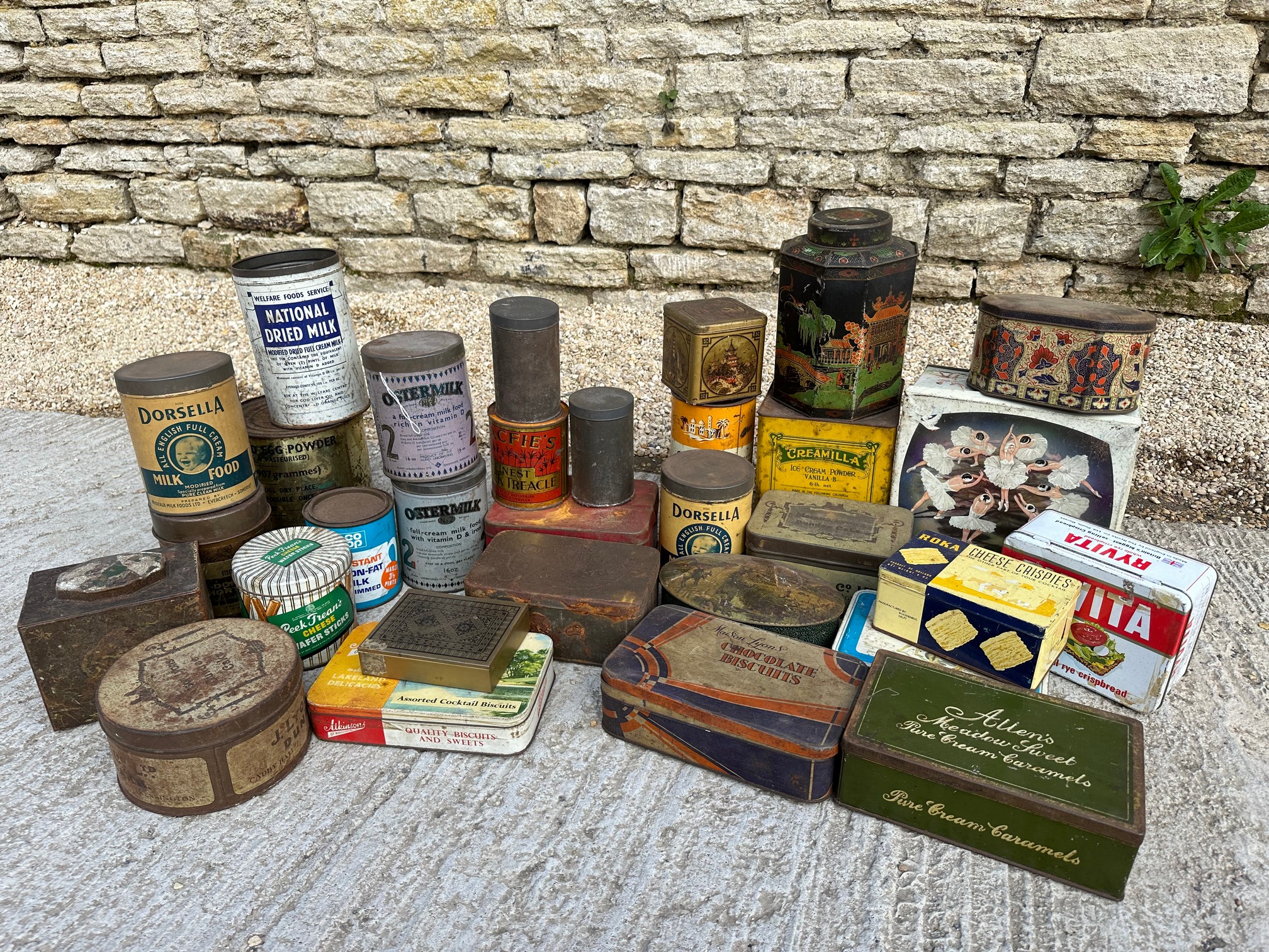A selection of food tins inc. Maison Lyons, Dorsella, Oster Milk, Peek Frean's Co-op etc.