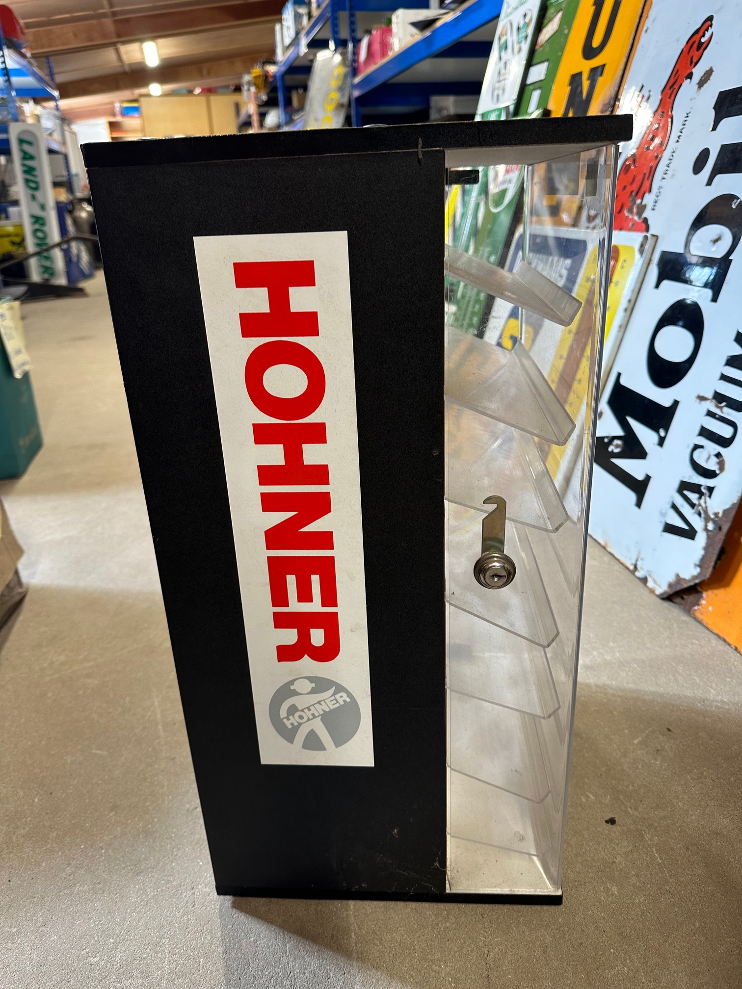 A display cabinet with perspex front and enclosed rear cabinet, with Hohner stickers to sides, 24" - Image 3 of 5