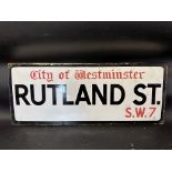 A City of Westminster enamel road sign for Rutland St. S.W.7, 30 x 12".