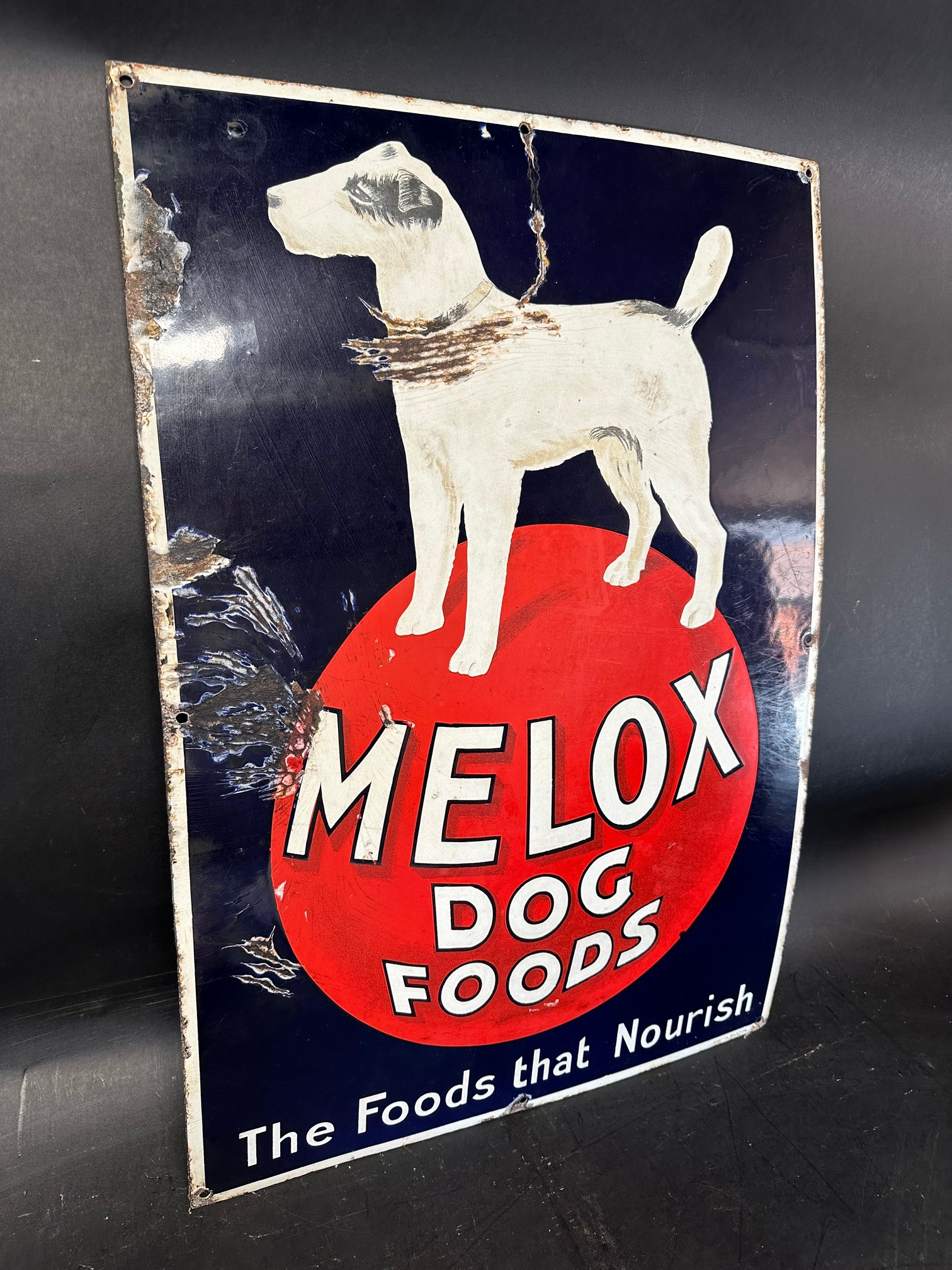 A Melox Dog Foods 'The Foods that Nourish' pictorial enamel advertising sign, 18 x 26".