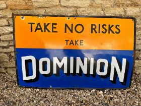 A Dominion "Take No Risks" single sided enamel adverting sign of good colour, 48 x 31".