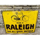 A large Raleigh enamel advertising sign with illustration of bicycle, 'Ride a Raleigh the All-