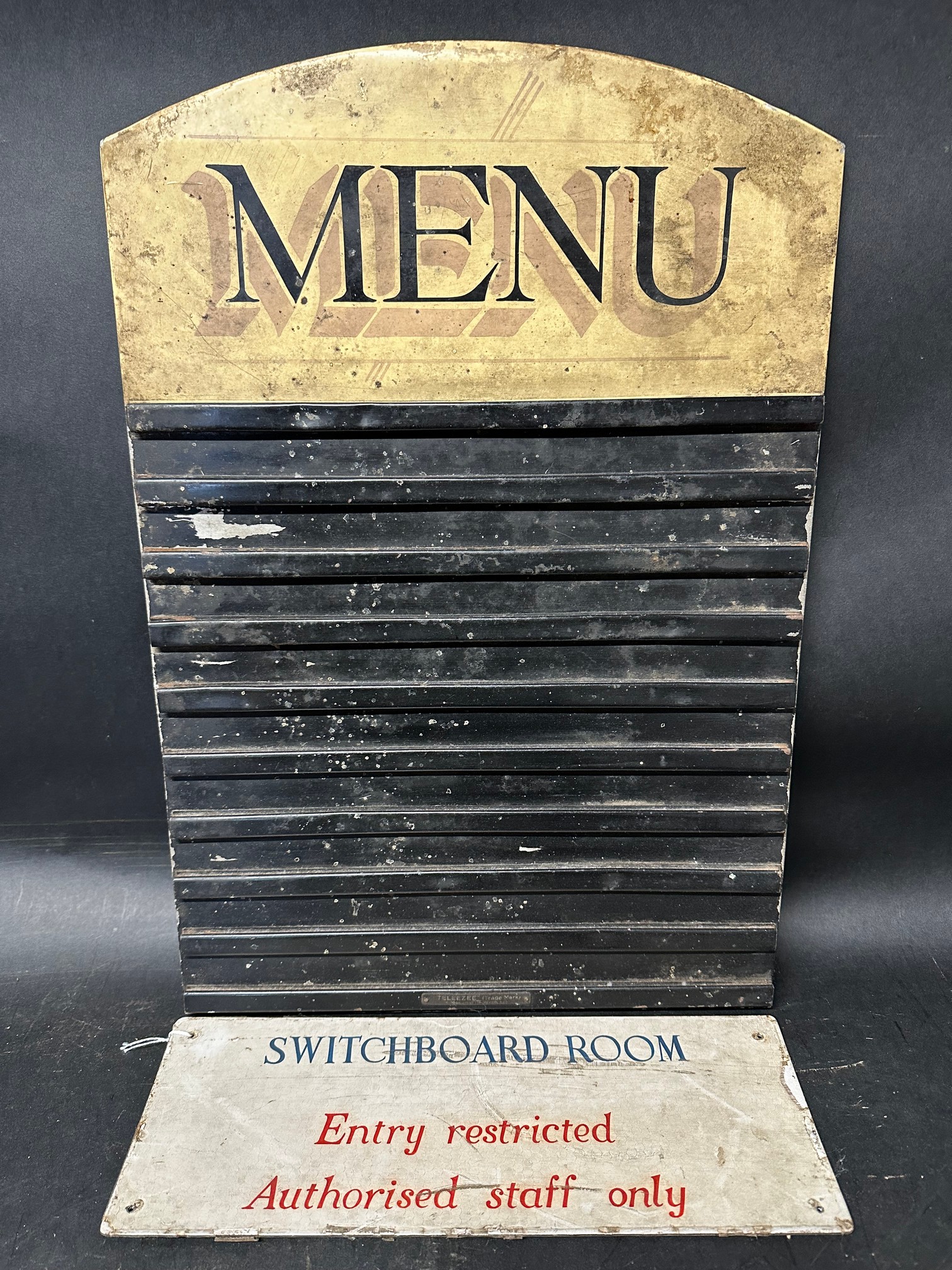 A Cafe Menu sign (metal on wooden frame), 15 x 22" and a Switchboard Room sign, 15 1/4 x 5 1/2".