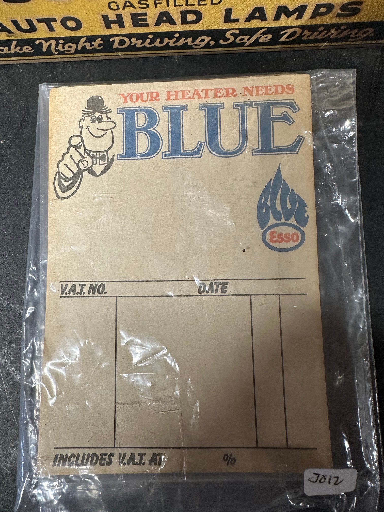 A box of Sunshine gas-filled Auto Head Lamps, new old stock and an Esso Blue invoice pad. - Image 2 of 5