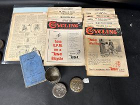 Two collapsible Cyclists cups (1900s), 11 wartime copies of Cycling journal 1941 (5), 1942 (3),