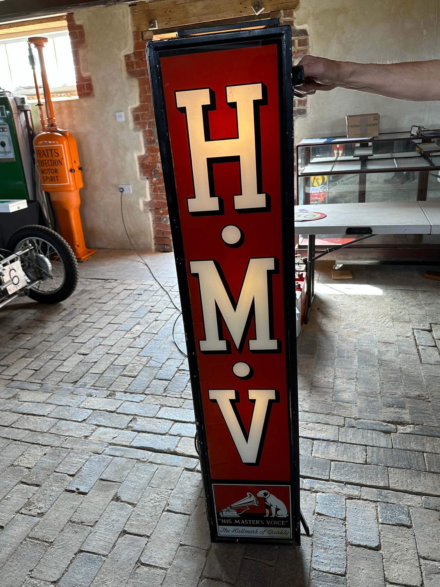 A superb and rare glass panelled HMV wall-mounted lightbox, 61 1/2 x 13 x 13 1/2".