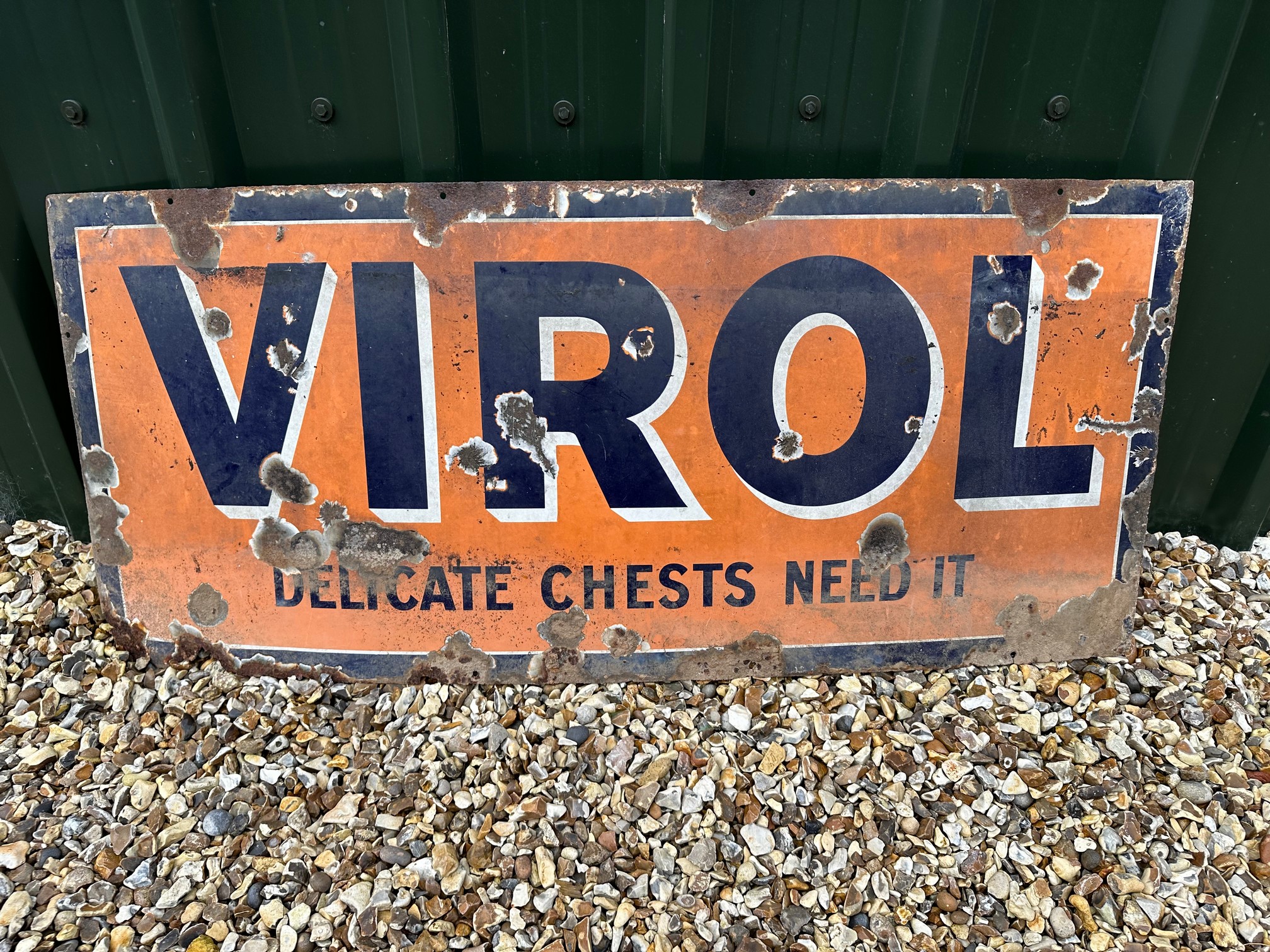 A Virol 'Delicate Chests Need It' enamel advertising sign by Patent Enamel, 48 x 21", by repute from