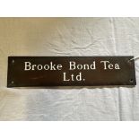 A Brooke Bond Tea Ltd. brass door push/plaque, 9 1/2 x 2 1/4".