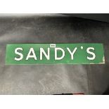 An enamel sign for 'Sandy's', 23 1/2 x 5".