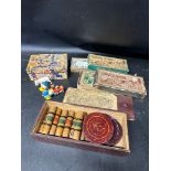 A selection of early toys and games including a Donald Duck ramp walker, The Lightning Dart Wheel,