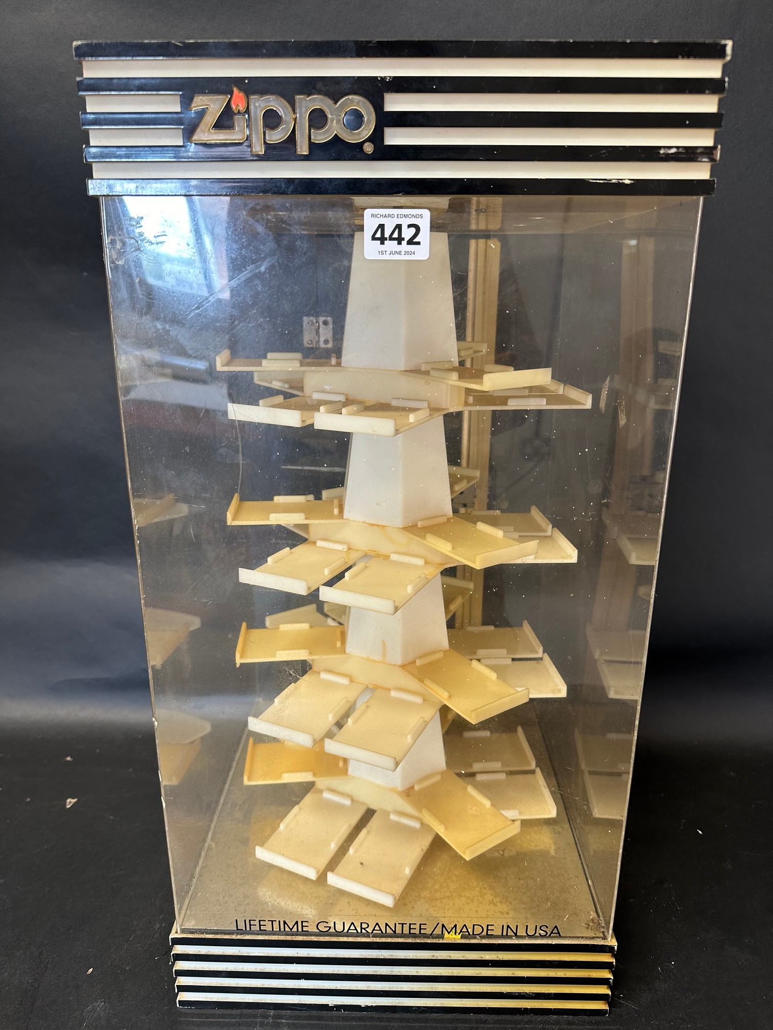 A Zippo (lighters) shop counter display cabinet, rear door and central rotating column, made by