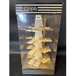 A Zippo (lighters) shop counter display cabinet, rear door and central rotating column, made by