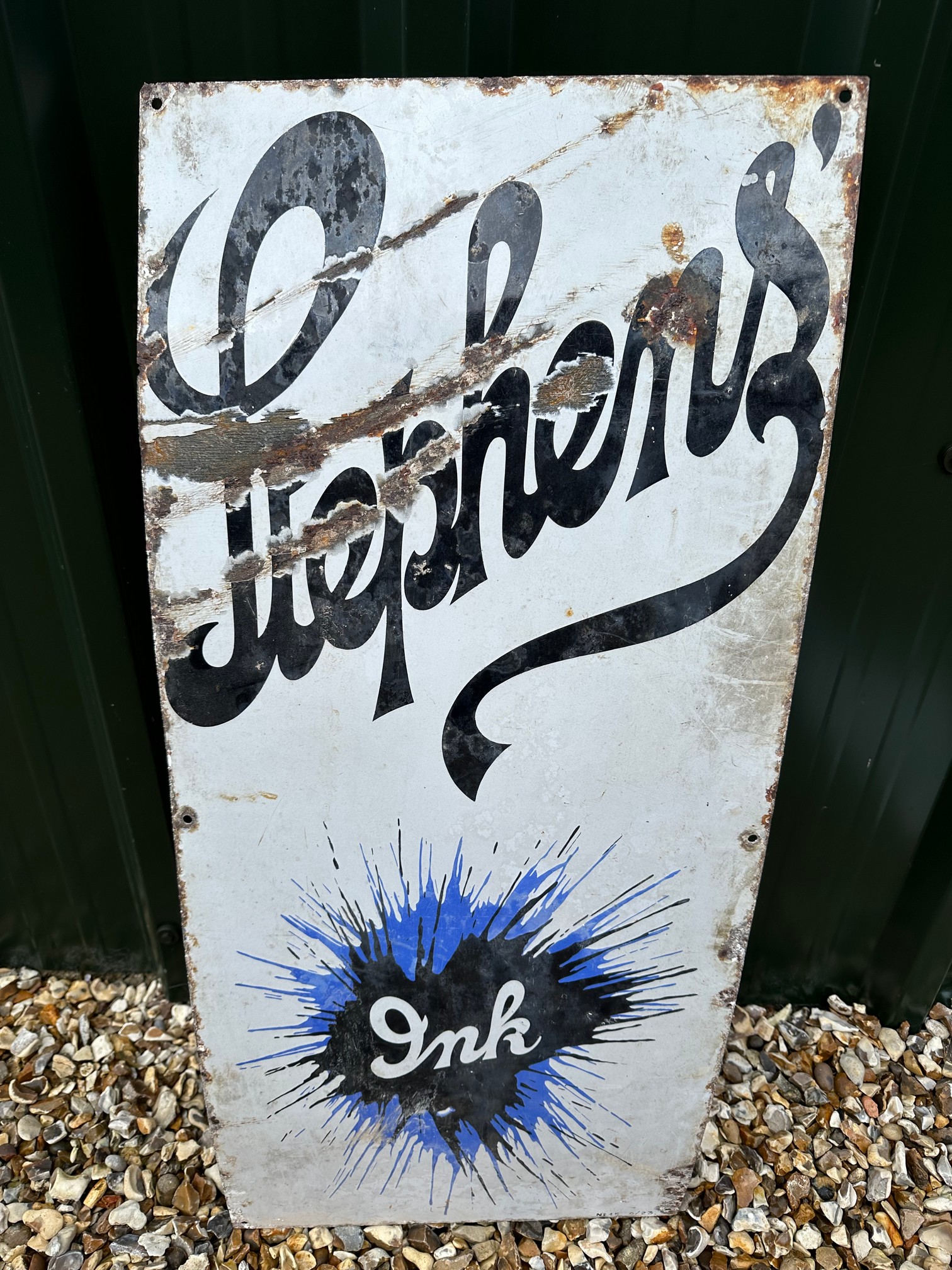 A Stephens' Ink vertical 'splash' enamel advertising sign, 16 x 36", by repute from Basingstoke