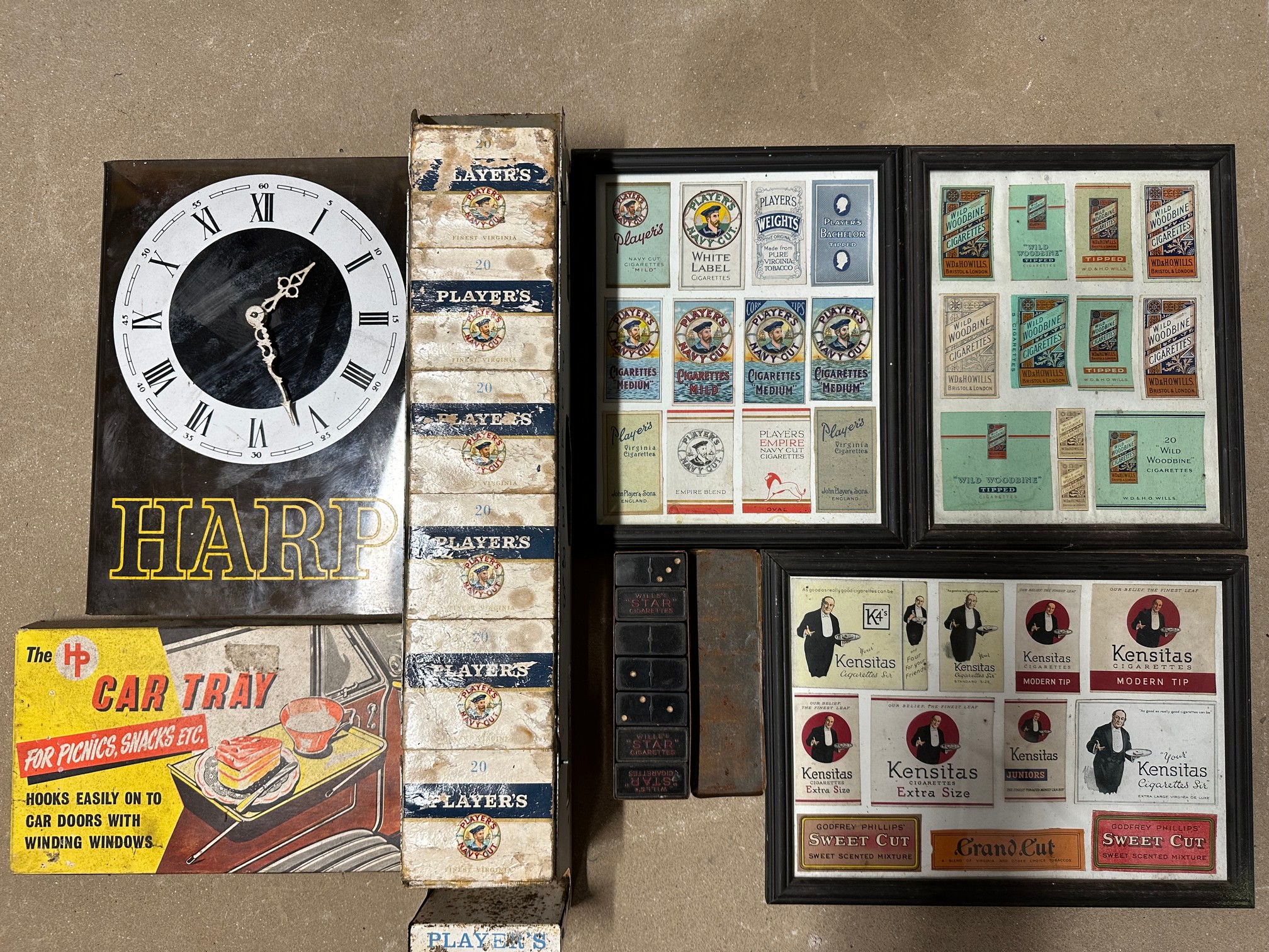 A Player's Navy Cut vending machine/dispenser, a tin of dominoes with Wills's STAR Cigarettes