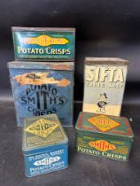 Four Smith's Potato Crisps tins and a Sifta Table Salt Sifta Sam 'Jolly Good Salt' tin (5).