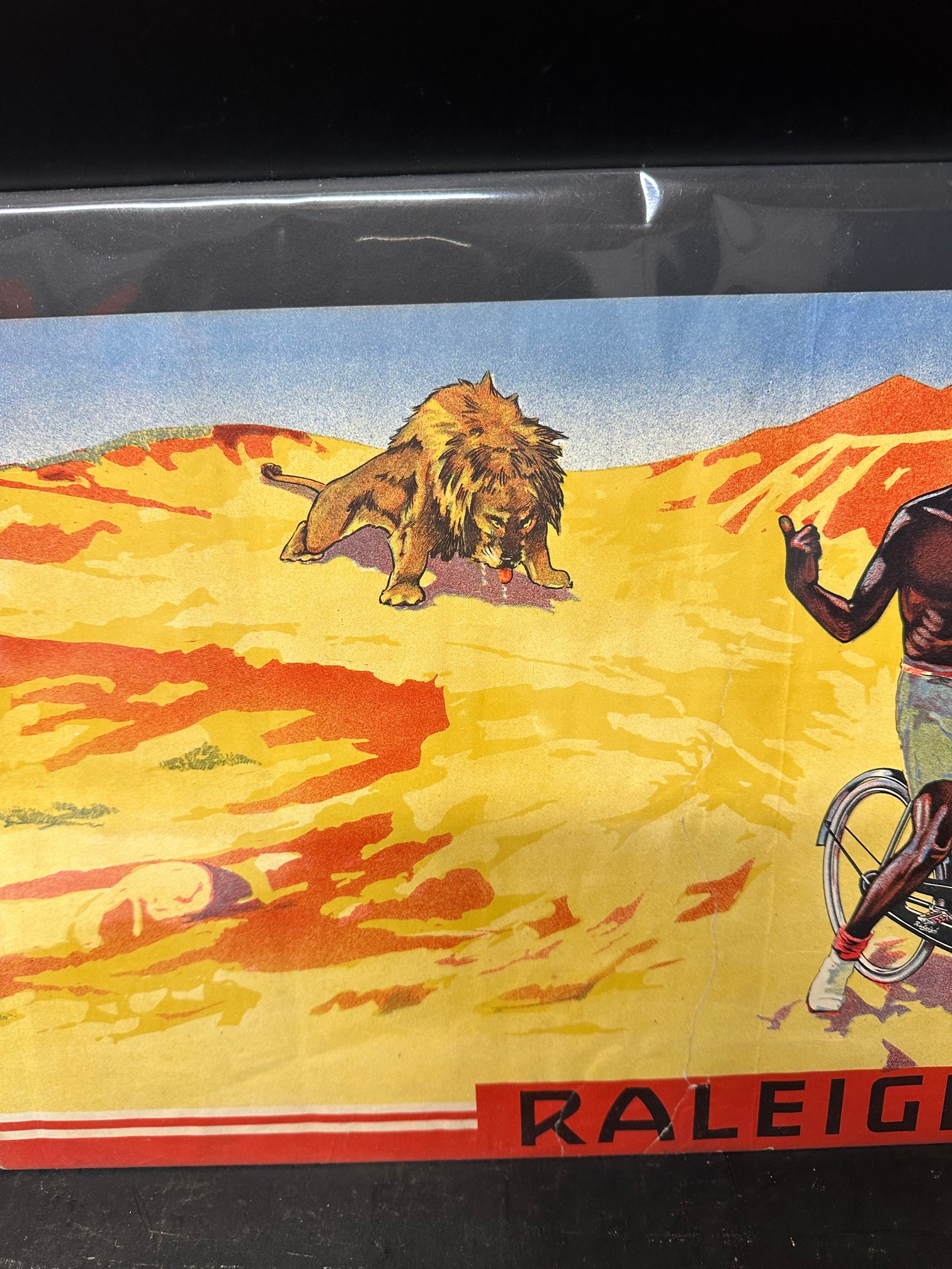 A Raleigh poster depicting a cyclist laughing at the lion's chance of catching him when on a Raleigh - Image 3 of 9