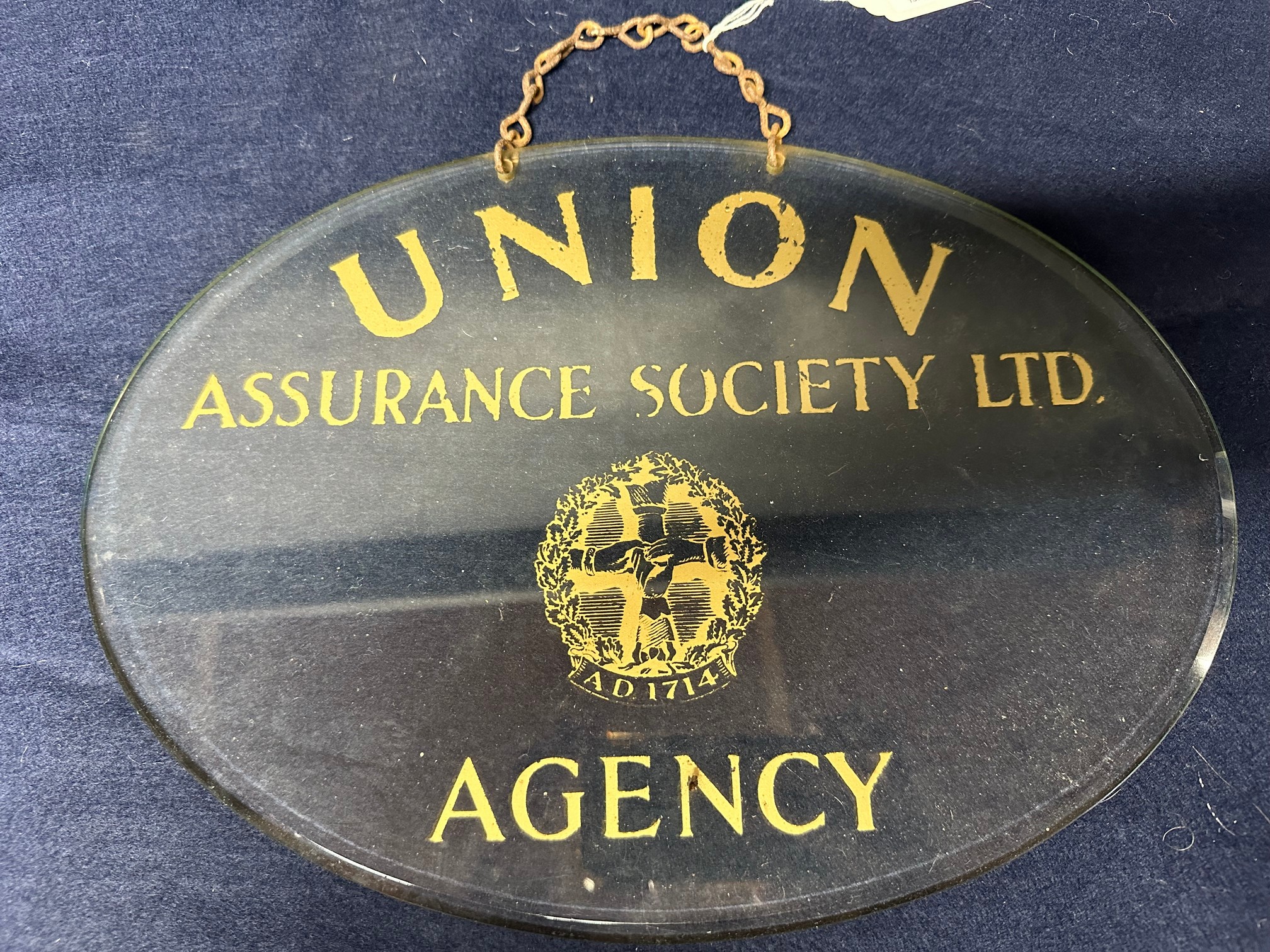 A Union Assurance Society Ltd. Agency bevelled-edged glass hanging advertising sign, 13 x 9 1/2".