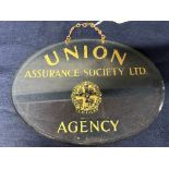 A Union Assurance Society Ltd. Agency bevelled-edged glass hanging advertising sign, 13 x 9 1/2".