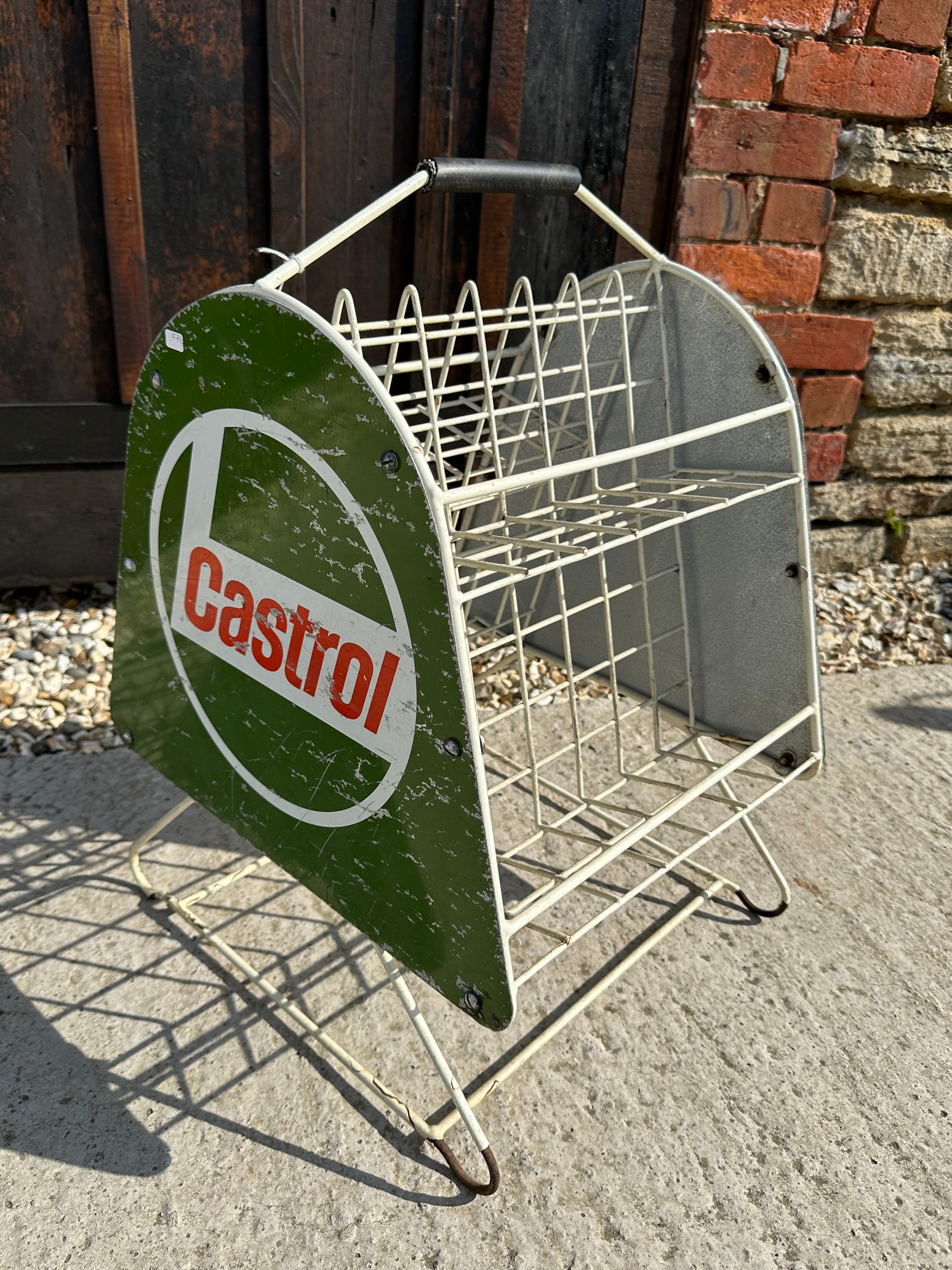 A Castrol oil can rack.