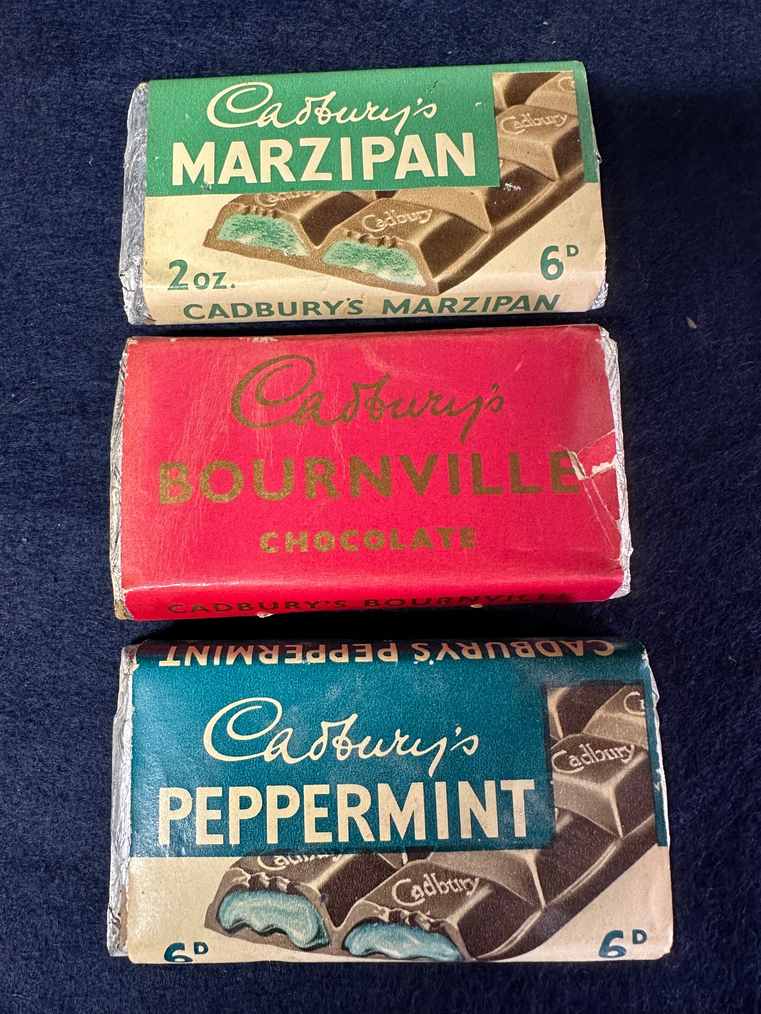 Three Cadbury's dummy chocolate bars: Bournville, Peppermint and Marzipan.