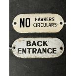 Two enamel door plaques: Back Entrance, 4 x 1 3/4" and NO Hawkers Circulars, 4 x 1 1/2".