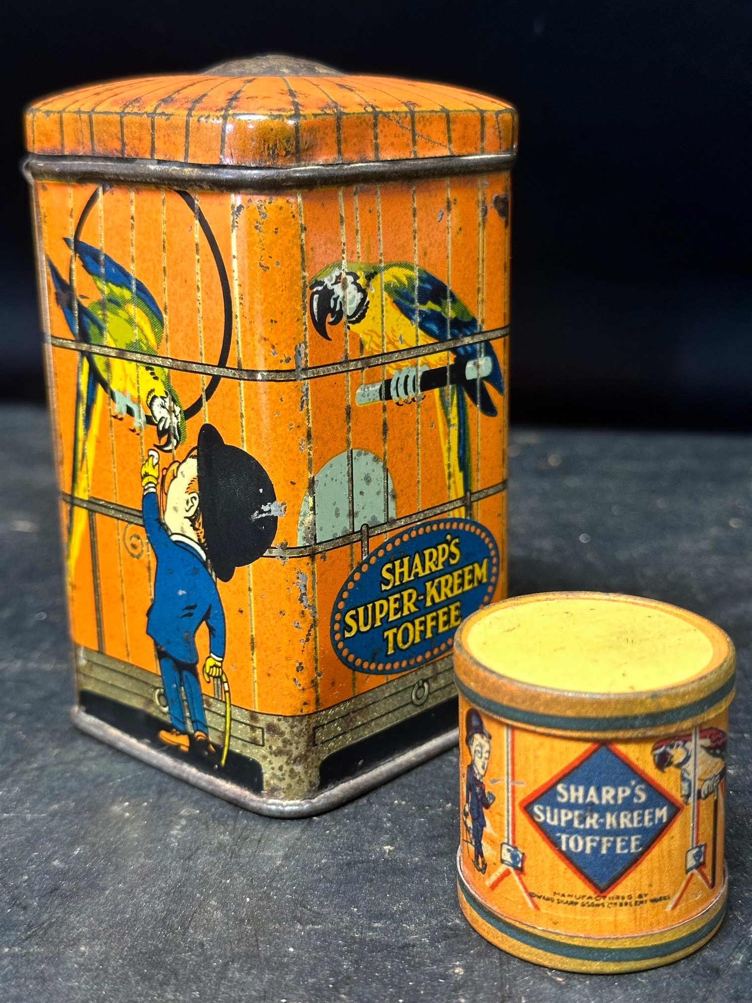 A Sharp's Super Kreem Toffee string dispensing tin, 4 1/4 x 2 1/4" and a miniature drum tin, 1 1/