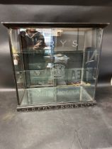 A Fry's Choice Chocolates glass display cabinet, sliding doors to rear, two glass shelves, 27 1/2"