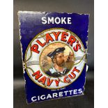 A Player's Navy Cut Tobacco double sided enamel advertising sign lacking flange, 14 3/4 x 20".