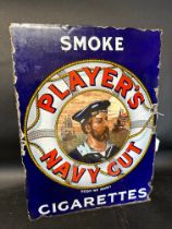 A Player's Navy Cut Tobacco double sided enamel advertising sign lacking flange, 14 3/4 x 20".
