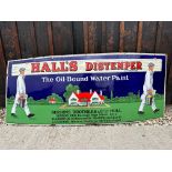 A Hall's Distemper enamel advertising sign depicting two decorators carrying paint and a plank, by