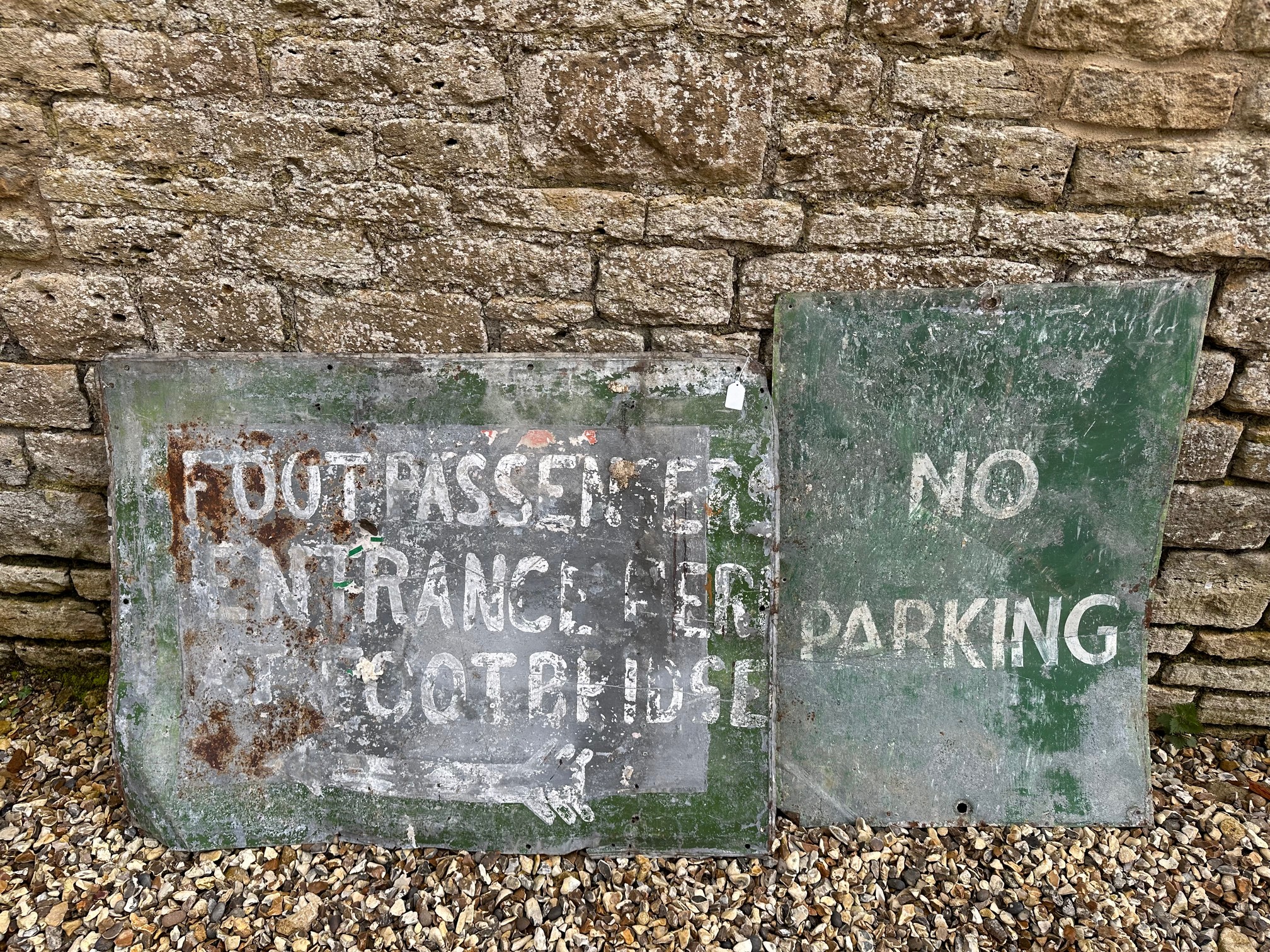 Two tin signs: No Parking, 25 1/4 x 36" and Foot Passengers Entrance at Footbridge, 44 x 32 1/4",