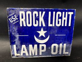 A 1930s Rock Light Lamp Oil double sided enamel advertising sign by Patent Enamel Co. Ltd. 13 x 10".