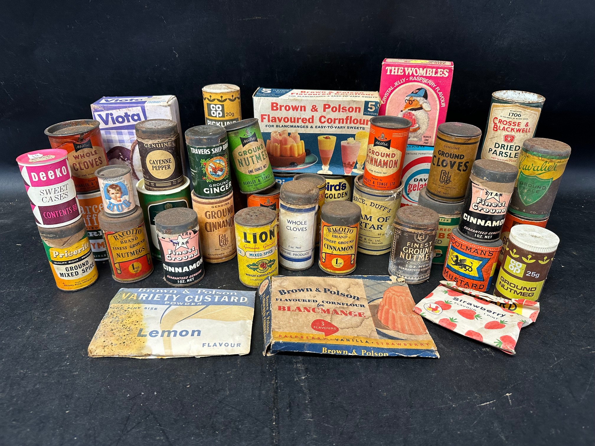 A selection of mid-century kitchen store cupboard items inc. The Wombles jelly mix.