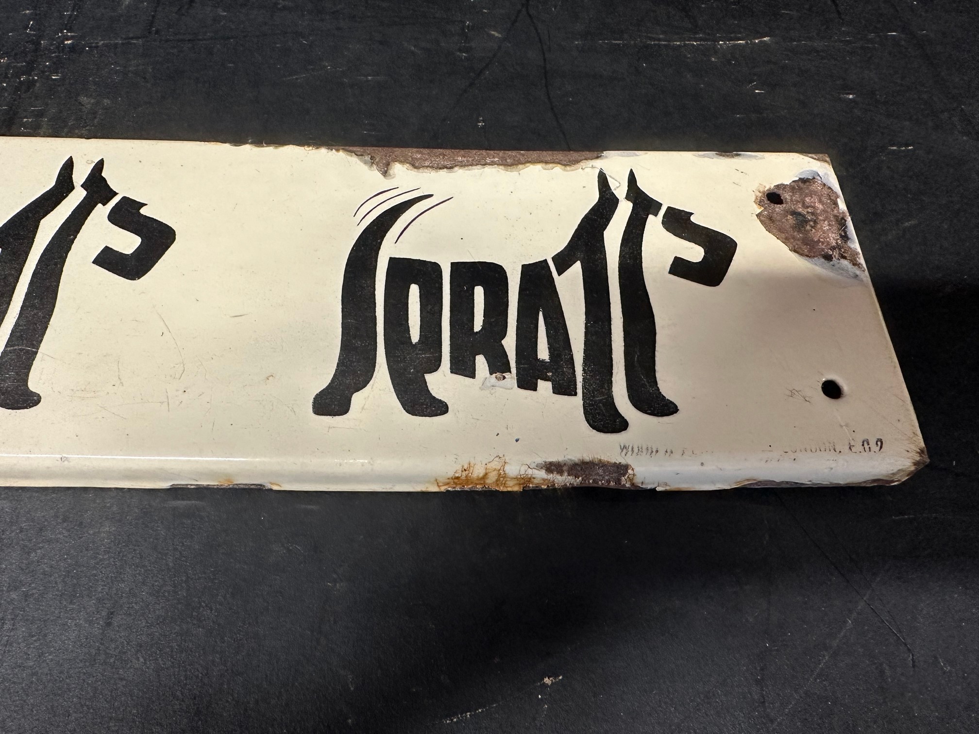 A Spratts enamel advertising sign, the brand forming the bodies of three dogs, 20 1/4 x 4 1/4". - Image 5 of 5